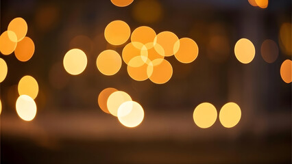 A bokeh image of warm, golden-orange circular lights, softly blurred against a dark, rich brown background.