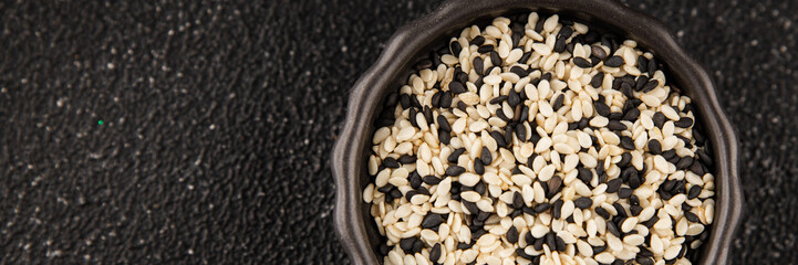 Sesame spice mix white and black tasty fresh gourmet food background on table rustic food top view copy space