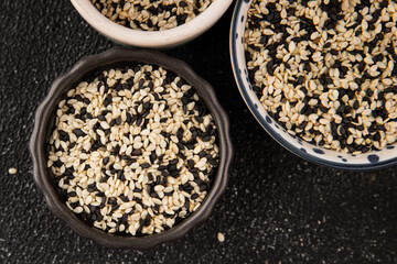 Sesame spice mix white and black tasty fresh gourmet food background on table rustic food top view copy space