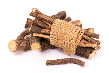 Licorice Root Sticks on White Background – Natural Herbal Remedy and Wellness Concept







