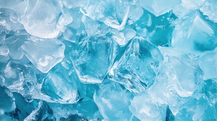 Obraz premium Ice cubes in cool blue and cyan hues create a refreshing visual of frozen water crystals