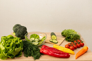 Vegetables from the garden. Ingathering. Making salad at home in the kitchen
