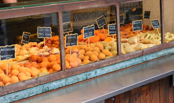 southern italy specialties with italian names like arancini which are fried rice balls and stuffed ascolana olives