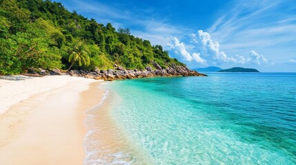 Fototapeta premium A remote tropical island with white sand beaches and crystal-clear blue waters. 