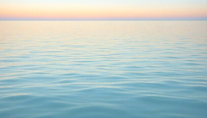 Fototapeta premium Turquoise Water Reflecting Pale Blue Sky at Dawn
