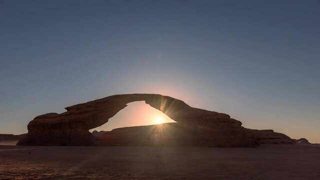 Time lapse of Sunset motion in rainbow arch beautiful rock desert in Al ula, Madinah, Saudi Arabia