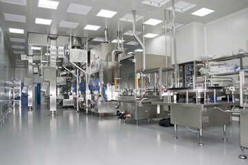 Automatic medicine production line in a clean room.