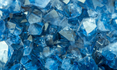 Blue Crystal Mineral Stone. Gems. Mineral crystals in the natural environment. Texture of precious and semiprecious stones. Seamless background with copy space colored shiny surface of precious stones