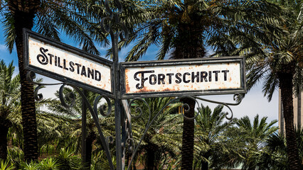 Fototapeta premium Signposts the direct way to Progress versus Standstill