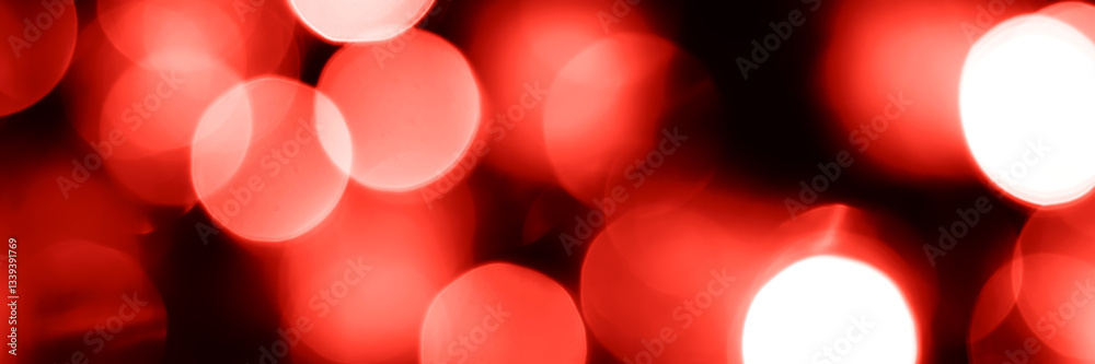Wall mural blurred lights red background, banner texture. abstract bokeh with soft light header. wide screen wa