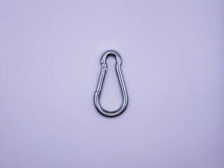 Steel carabiner, on a white background, top view