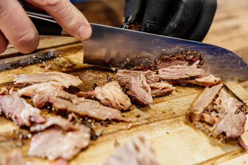 Perfectly Sliced BBQ Brisket on Wooden Board