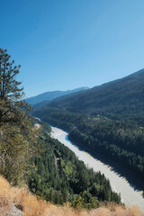 The Fraser River running through the Fraser Canyon during a summer season in Fraser Valley, British Columbia, Canada