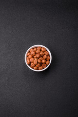 Raw hazelnuts without shells in a bowl