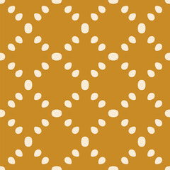 Simple minimal seamless ornament. Abstract geometric pattern with dots, spots, seeds in regular grid. Vintage background texture in mustard yellow color. Repeated design for decor, textile, carpet