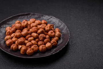 Raw hazelnuts without shells in a bowl