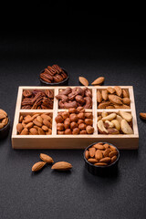 Wooden box with nuts cashew, hazelnut, almond, brazil, pecan, walnut