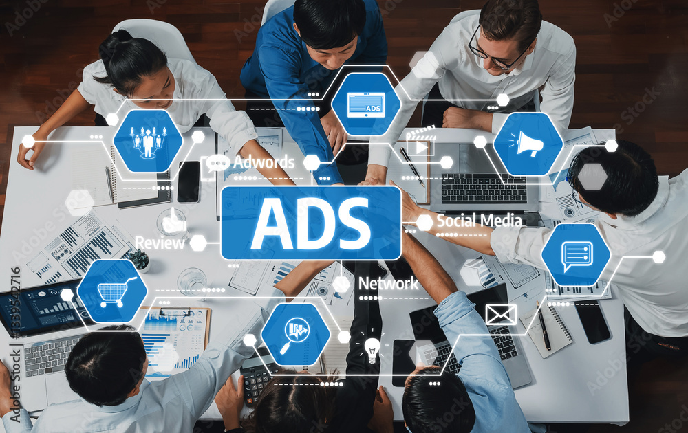 Leinwandbilder a dynamic team collaborates in a modern workspace, discussing advertising strategies and analytics, 