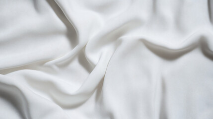 Obraz premium Elegant Drapery: A close-up shot showcases the graceful folds and soft texture of flowing fabric, creating a sense of fluidity, luxury, and understated elegance.