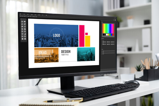 Graphic designer software for modern design of web page and commercial brisk ads showing on the computer screen