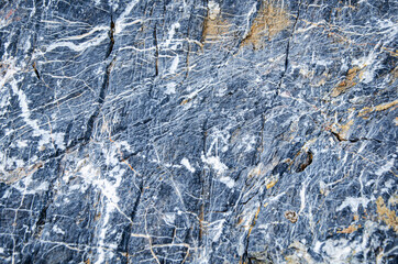 Close-up of Textured Slate Rock Surface with Veins