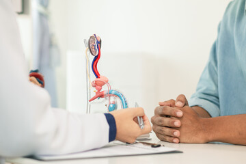 A young man suffering from erectile dysfunction seeks consultation with a specialist to identify...