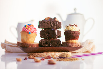 chocolate cake with cupcake and coffe