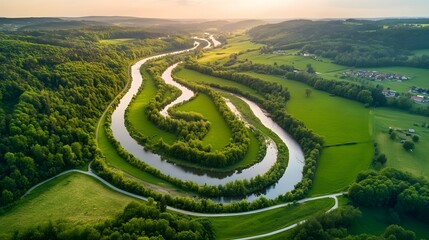 Aerial View Serpentine River Winding Through Lush Green Landscape