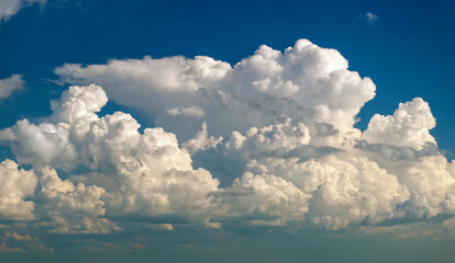 Rain clouds forming on blue Florida sky. Colorful summer skyscape