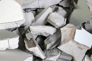 Broken concrete, Piles of lightweight construction bricks after house demolition