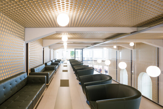 Modern lounge in club with unique ceiling pattern and seating