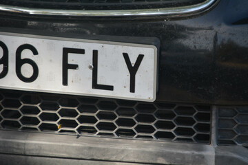 High-quality image of a Spanish license plate (matr&iacute;cula espa&ntilde;ola) on a vehicle, showcasing the European Union blue strip with the 'E' country code for Spain. 