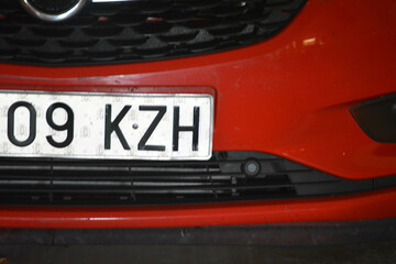 High-quality image of a Spanish license plate (matr&iacute;cula espa&ntilde;ola) on a vehicle, showcasing the European Union blue strip with the 'E' country code for Spain.  KZH