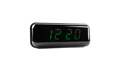 Digital alarm clock showing 12:20 o'clock on white background