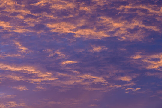Beautiful evening sky with purple and orange clouds