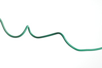One green electrical wire on white background