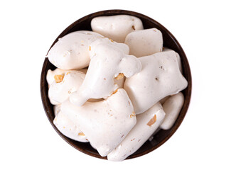 Freeze Dried White Nougat Candy Bar with Pieces of Peanut Isolated on a White Background