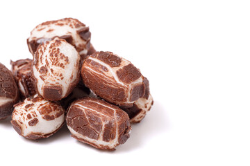 Chewy Mini Chocolate Covered Nougat Candies Isolated on a White Background