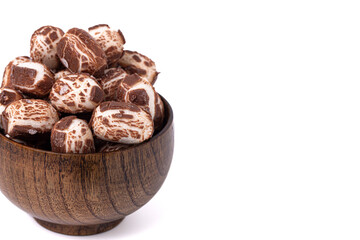 Chewy Mini Chocolate Covered Nougat Candies Isolated on a White Background