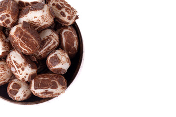 Chewy Mini Chocolate Covered Nougat Candies Isolated on a White Background