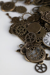 Watch gears piled up on white background
