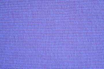 Lavender fabric texture close-up. Soft cotton textile background with diagonal weave pattern. Violet cloth surface for fashion, design, and textile projects.