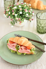 Ham and Cheese Croissant Sandwich. Healthy breakfast.