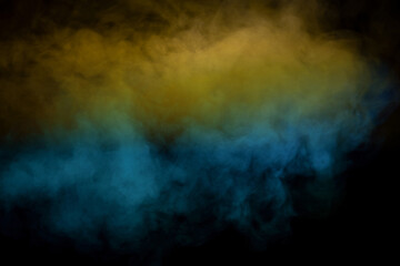 Yellow steam on a black background.