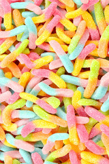 Juicy colorful jelly sweets. Gummy candies. Snakes.