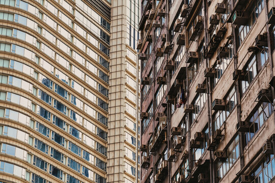 Architectural contrast between modern and old buildings in Hong Kong