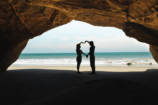 Romantic Silhouettes in Beach Cave at Mancora, Peru