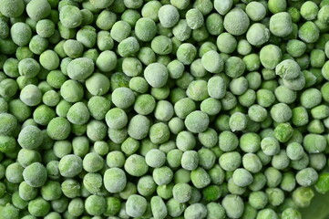 frozen green peas close-up, frozen green peas macro as background	
