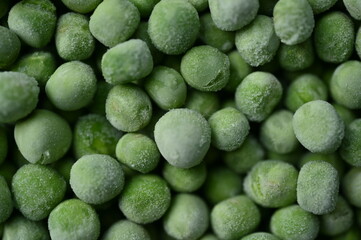 frozen green peas close-up, frozen green peas macro as background	
