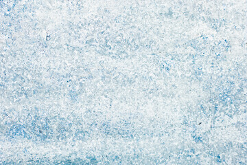 Obraz premium Close-up background of frosty textured surface with crystalline ice patterns for your text